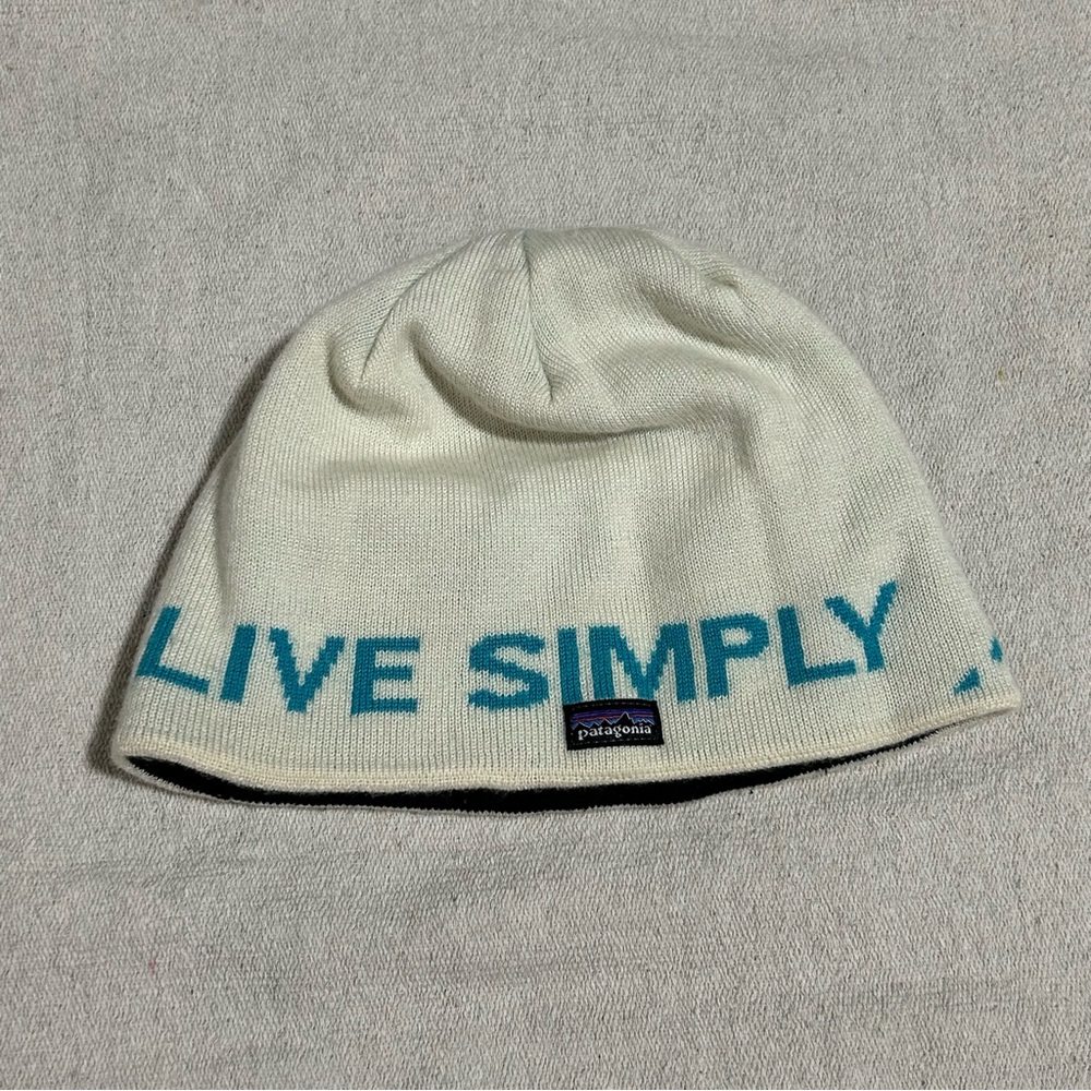 Patagonia Cream Beanie with Teal Text